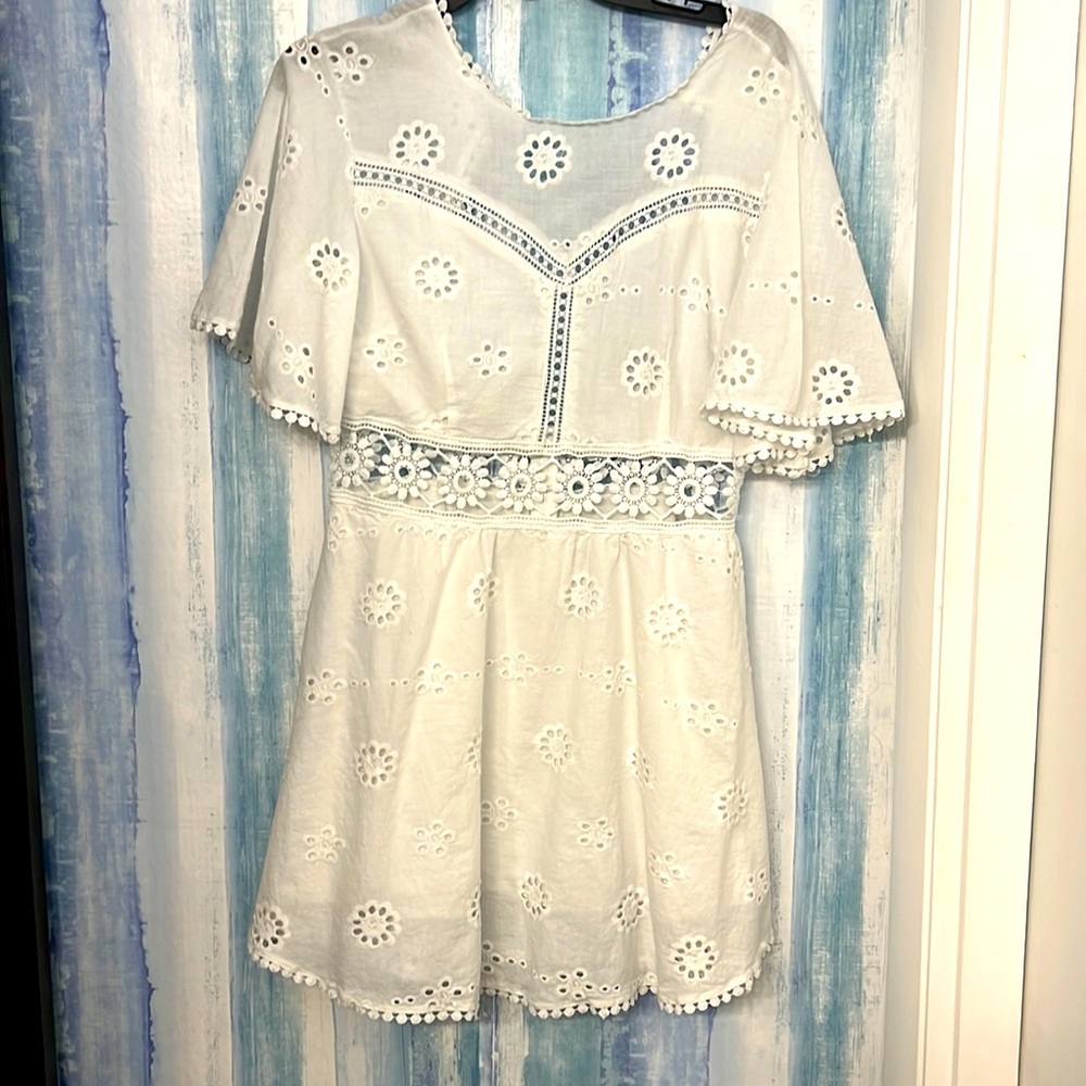 white dress embroidered back opening